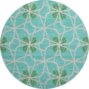 Photo of 8' Aqua Green And Beige Geometric Washable Round Rug With UV Protection