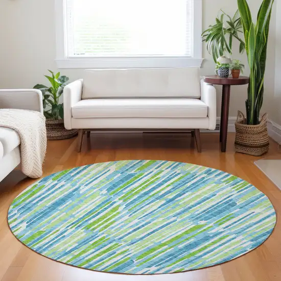 8' Aqua Green And Ivory Abstract Washable Round Rug With UV Protection Photo 5