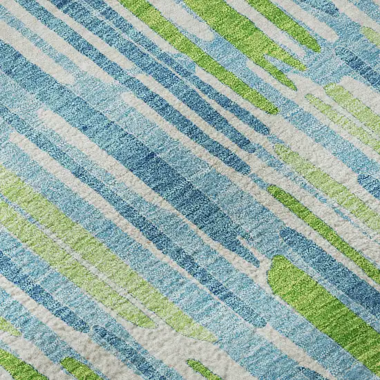 8' Aqua Green And Ivory Abstract Washable Round Rug With UV Protection Photo 9