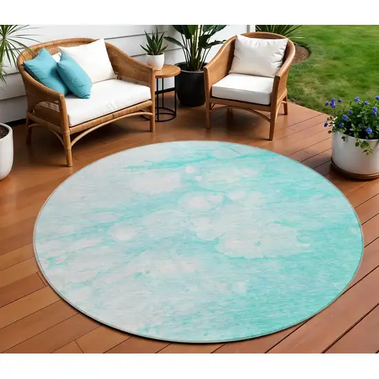 8' Aqua Ivory And Teal Blue Round Abstract Washable Indoor Outdoor Area Rug Photo 1
