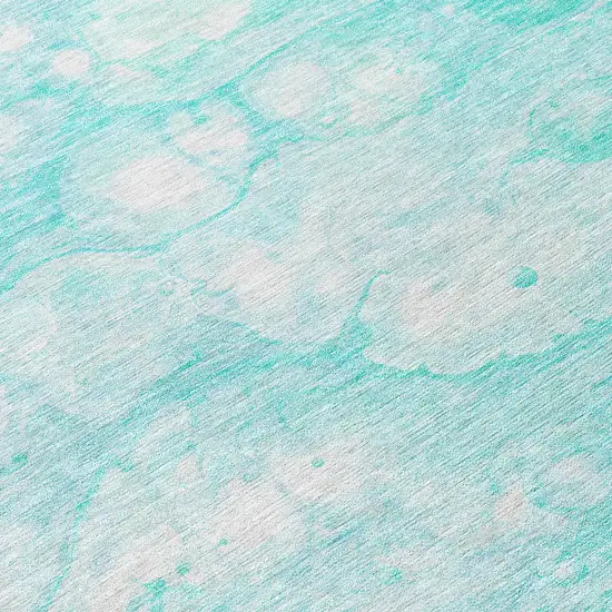 8' Aqua Ivory And Teal Blue Round Abstract Washable Indoor Outdoor Area Rug Photo 7