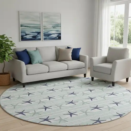 8' Aqua Navy Blue And Ivory Geometric Washable Round Rug With UV Protection Photo 1