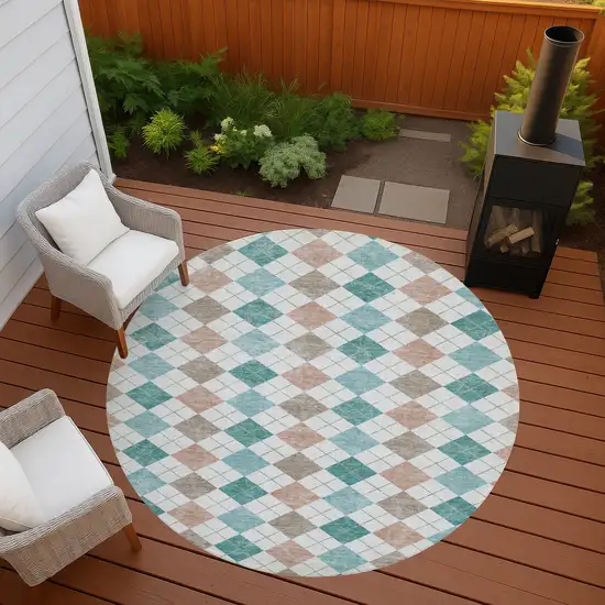 8' Aqua Peach And Ivory Round Geometric Washable Indoor Outdoor Area Rug Photo 8