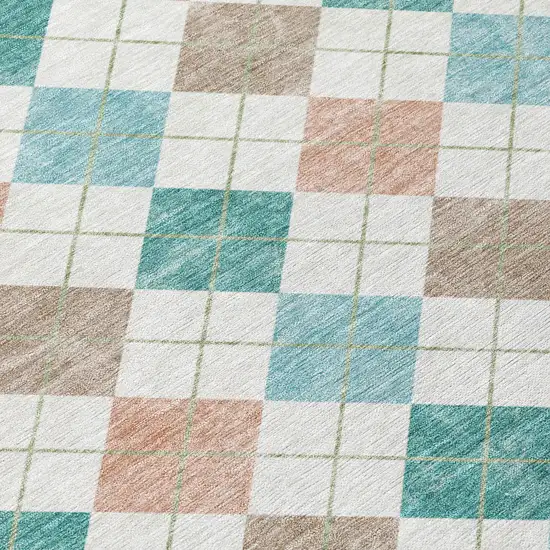 8' Aqua Peach And Ivory Round Geometric Washable Indoor Outdoor Area Rug Photo 7