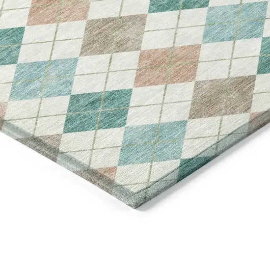 8' Aqua Peach And Ivory Round Geometric Washable Indoor Outdoor Area Rug Photo 6