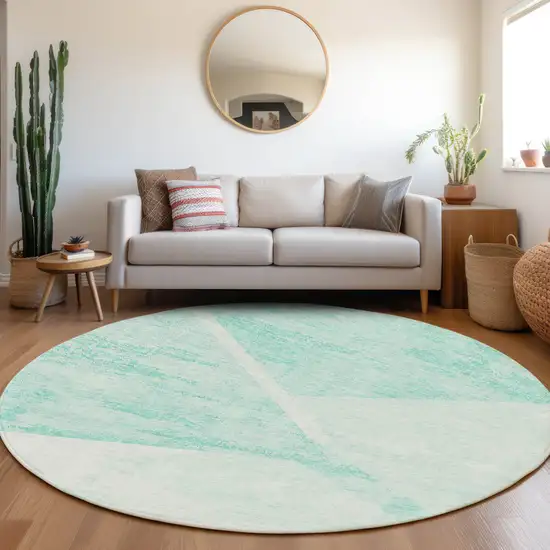 8' Aqua Sky Blue And Ivory Round Abstract Washable Indoor Outdoor Area Rug Photo 7