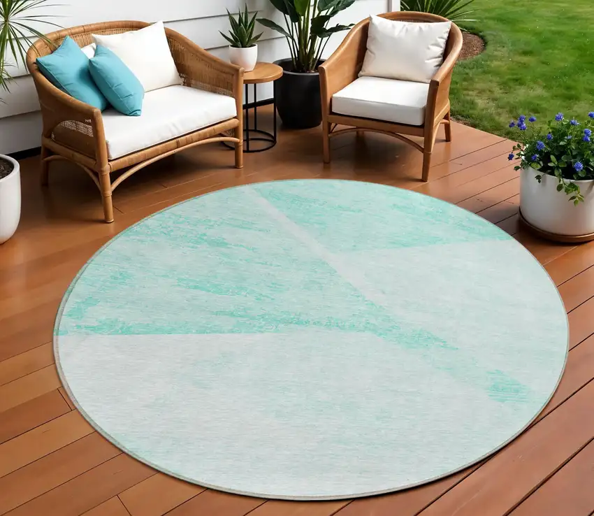 8' Aqua Sky Blue And Ivory Round Abstract Washable Indoor Outdoor Area Rug Photo 1