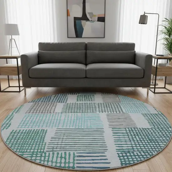 8' Aqua Teal And Ivory Geometric Washable Round Rug With UV Protection Photo 2