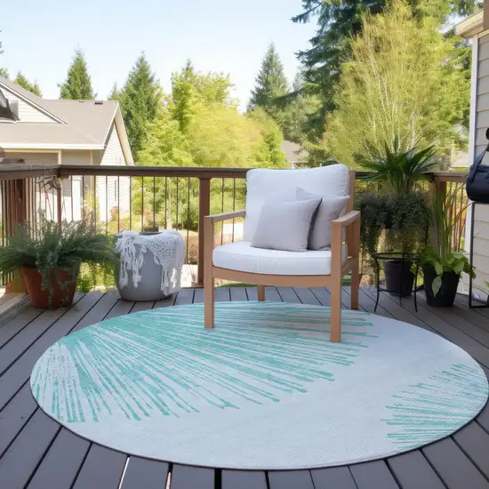 8' Aquamarine And Ivory Round Abstract Washable Indoor Outdoor Area Rug Photo 6