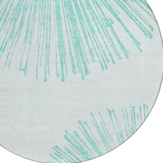 8' Aquamarine And Ivory Round Abstract Washable Indoor Outdoor Area Rug Photo 4