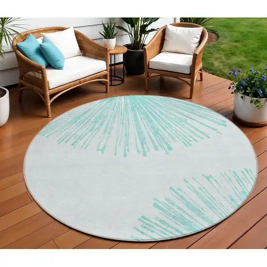 8' Aquamarine And Ivory Round Abstract Washable Indoor Outdoor Area Rug Photo 1