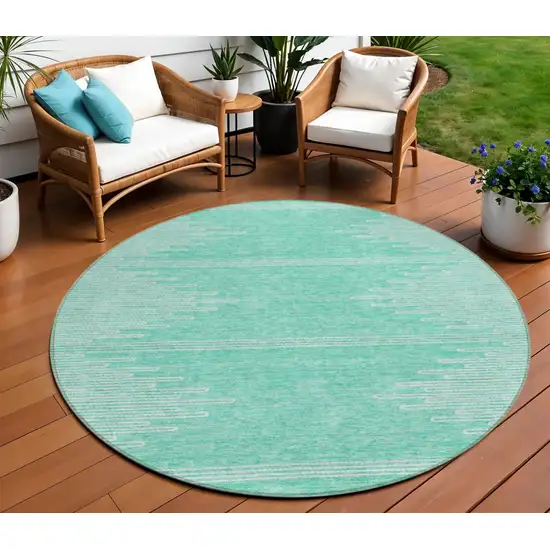8' Aquamarine And Ivory Round Abstract Washable Indoor Outdoor Area Rug Photo 1