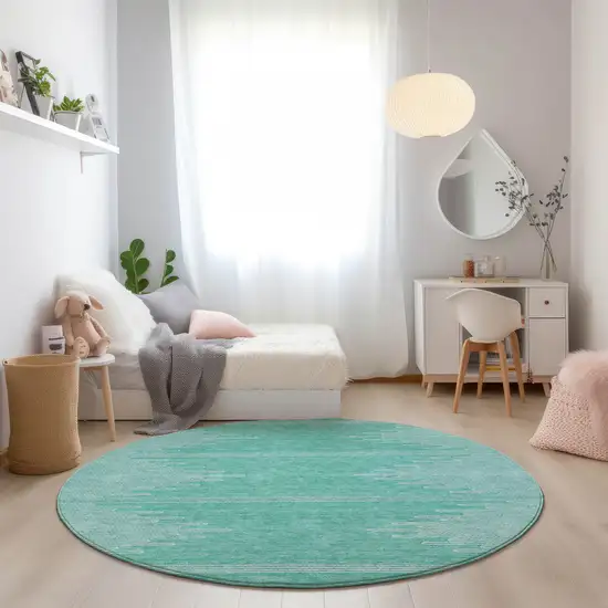 8' Aquamarine And Ivory Round Abstract Washable Indoor Outdoor Area Rug Photo 7