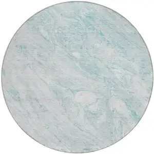 Photo of 8' Aquamarine Aqua And Ivory Round Abstract Washable Indoor Outdoor Area Rug