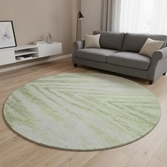 8' Artichoke Green And Beige Abstract Washable Round Rug With UV Protection Photo 2