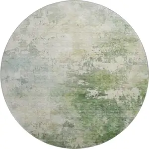 Photo of 8' Artichoke Green And Beige Abstract Washable Round Rug With UV Protection