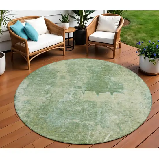 8' Artichoke Green And Beige Round Abstract Washable Indoor Outdoor Area Rug Photo 1