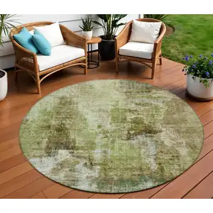 Photo of 8' Artichoke Green And Beige Round Abstract Washable Indoor Outdoor Area Rug