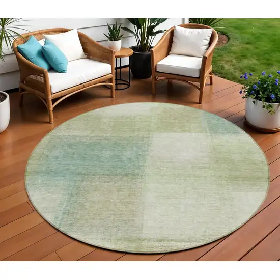 8' Artichoke Green And Beige Round Abstract Washable Indoor Outdoor Area Rug Photo 1