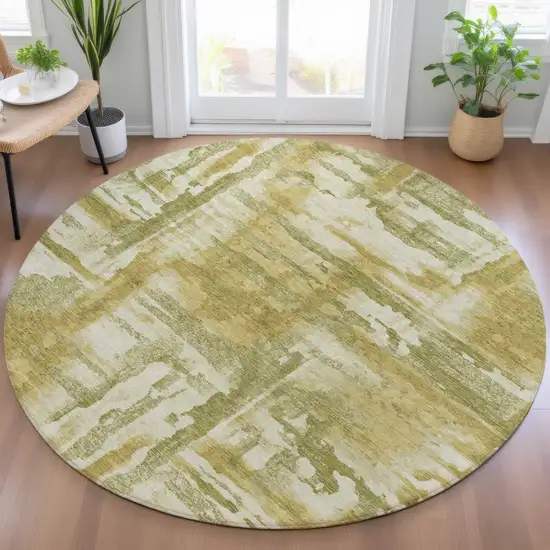8' Artichoke Green And Gold Round Abstract Washable Indoor Outdoor Area Rug Photo 5