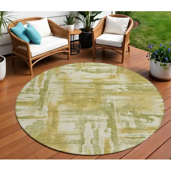 8' Artichoke Green And Gold Round Abstract Washable Indoor Outdoor Area Rug Photo 2