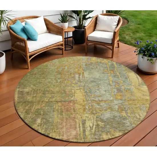 8' Artichoke Green And Gold Round Abstract Washable Indoor Outdoor Area Rug Photo 1
