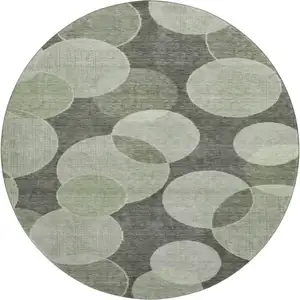 Photo of 8' Artichoke Green And Gray Geometric Washable Round Rug With UV Protection
