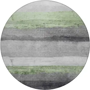 Photo of 8' Artichoke Green And Gray Round Striped Washable Indoor Outdoor Area Rug