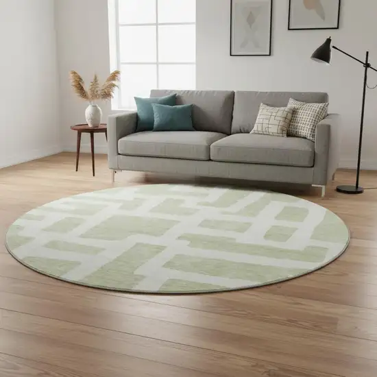 8' Artichoke Green And Ivory Abstract Geometric Washable Round Rug With UV Protection Photo 2