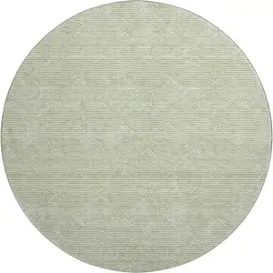 Photo of 8' Artichoke Green And Ivory Abstract Geometric Washable Round Rug With UV Protection