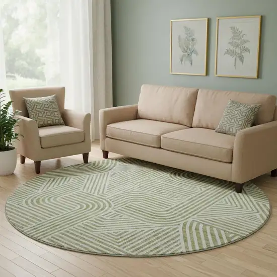 8' Artichoke Green And Ivory Abstract Geometric Washable Round Rug With UV Protection Photo 1