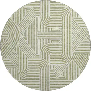 Photo of 8' Artichoke Green And Ivory Abstract Geometric Washable Round Rug With UV Protection