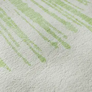 Photo of 8' Artichoke Green And Ivory Abstract Washable Round Rug With UV Protection