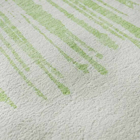 8' Artichoke Green And Ivory Abstract Washable Round Rug With UV Protection Photo 8