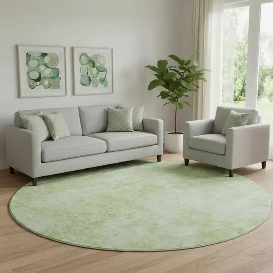 8' Artichoke Green And Ivory Abstract Washable Round Rug With UV Protection Photo 1