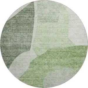 Photo of 8' Artichoke Green And Ivory Abstract Washable Round Rug With UV Protection
