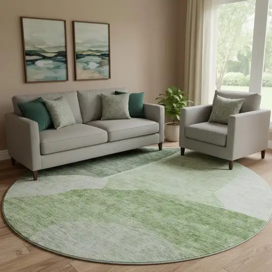 8' Artichoke Green And Ivory Abstract Washable Round Rug With UV Protection Photo 1