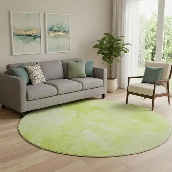 8' Artichoke Green And Ivory Abstract Washable Round Rug With UV Protection Photo 1