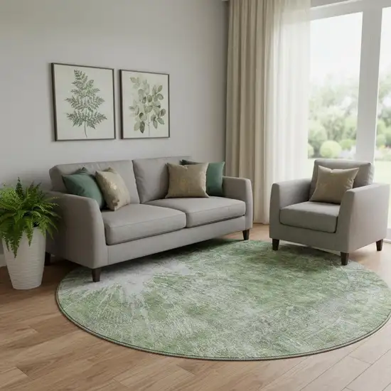 8' Artichoke Green And Ivory Abstract Washable Round Rug With UV Protection Photo 1