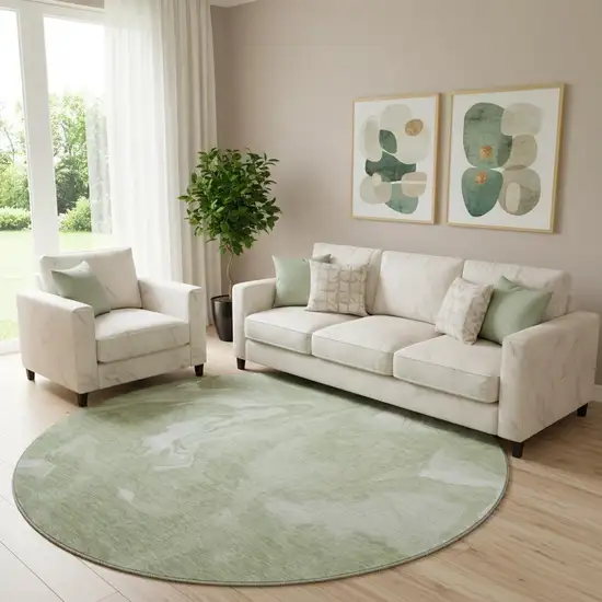 8' Artichoke Green And Ivory Abstract Washable Round Rug With UV Protection Photo 1