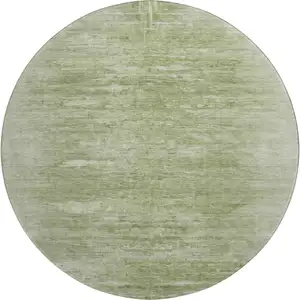 Photo of 8' Artichoke Green And Ivory Abstract Washable Round Rug With UV Protection