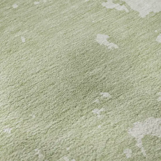 8' Artichoke Green And Ivory Abstract Washable Round Rug With UV Protection Photo 8