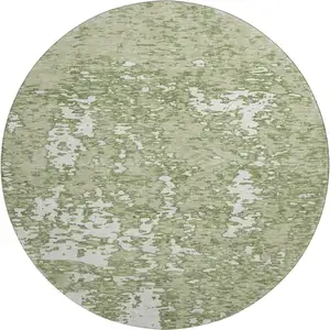 Photo of 8' Artichoke Green And Ivory Abstract Washable Round Rug With UV Protection