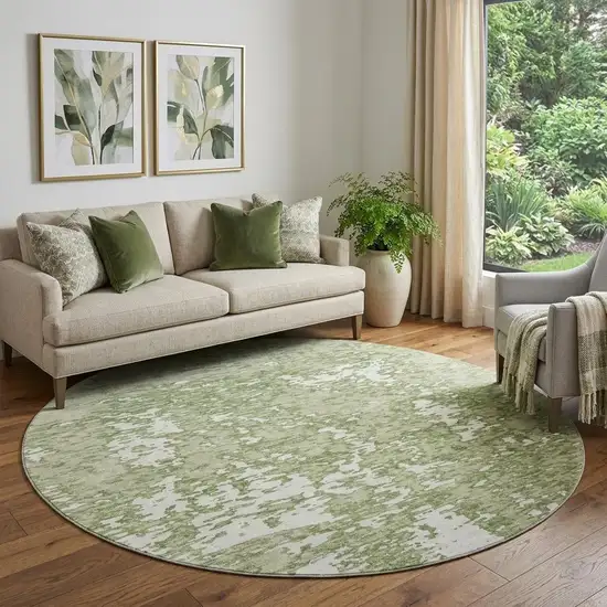 8' Artichoke Green And Ivory Abstract Washable Round Rug With UV Protection Photo 1