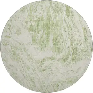 Photo of 8' Artichoke Green And Ivory Abstract Washable Round Rug With UV Protection