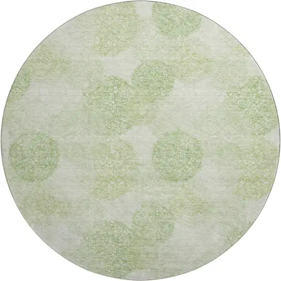 8' Artichoke Green And Ivory Abstract Washable Round Rug With UV Protection Photo 1