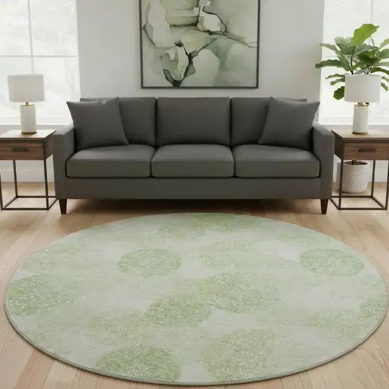 8' Artichoke Green And Ivory Abstract Washable Round Rug With UV Protection Photo 2