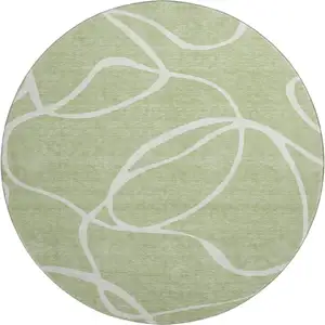 Photo of 8' Artichoke Green And Ivory Abstract Washable Round Rug With UV Protection