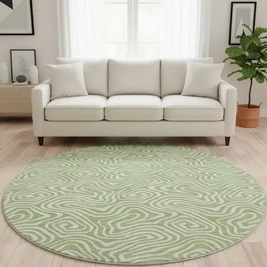 8' Artichoke Green And Ivory Abstract Washable Round Rug With UV Protection Photo 2