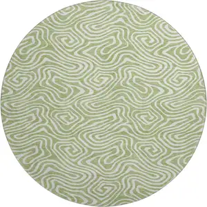 Photo of 8' Artichoke Green And Ivory Abstract Washable Round Rug With UV Protection